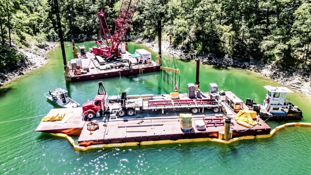 Two barges operate on a direct pipe project.